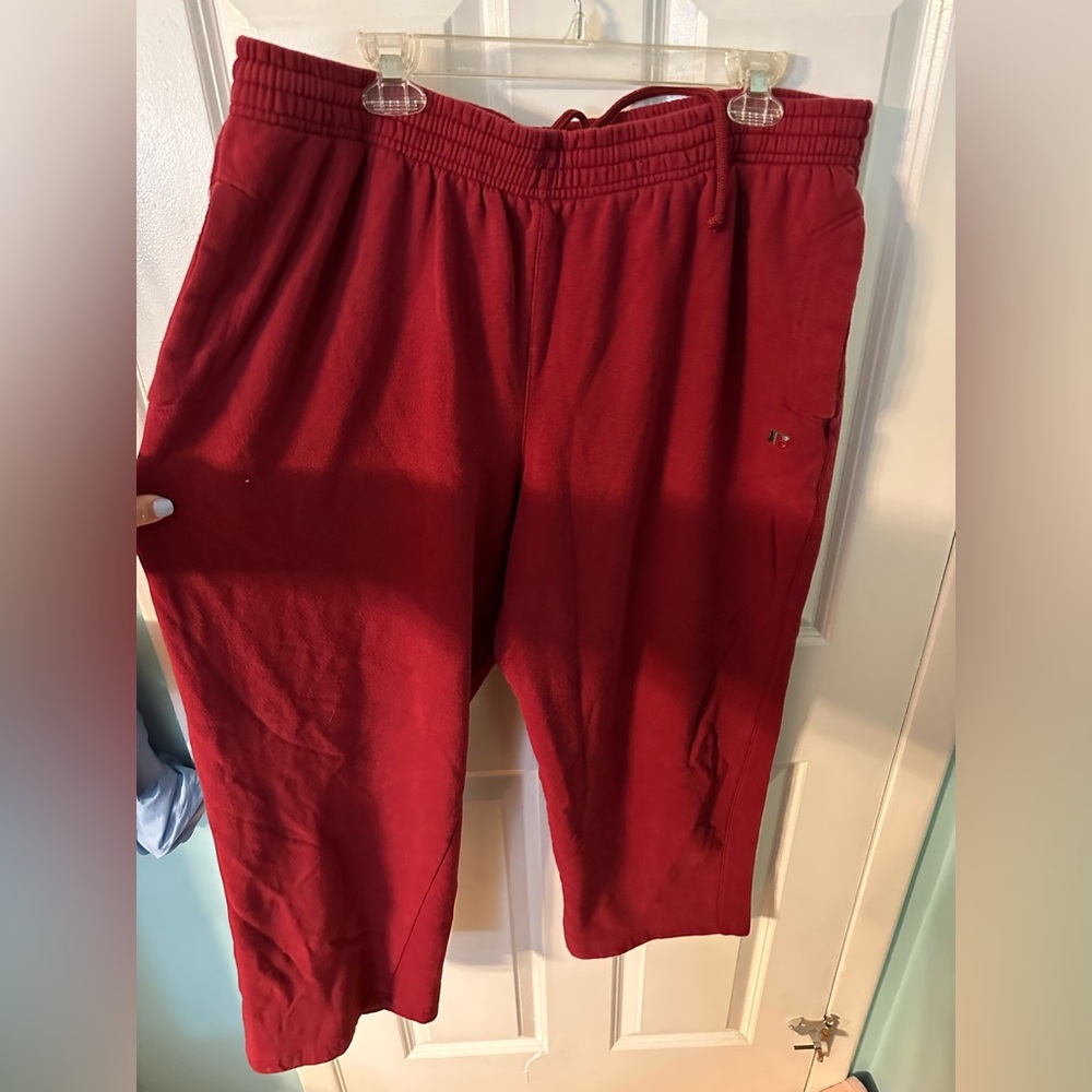 Lightly worn red sweatpants